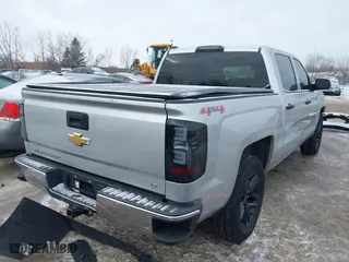 2014 Chevrolet Silverado 1500 LT with VIN 3GCUKREC7EG314914, listed as a IAAI auction lot 41368651 with 133,172 mi miles. Bid and sale history available at carsss.com. Image 4.