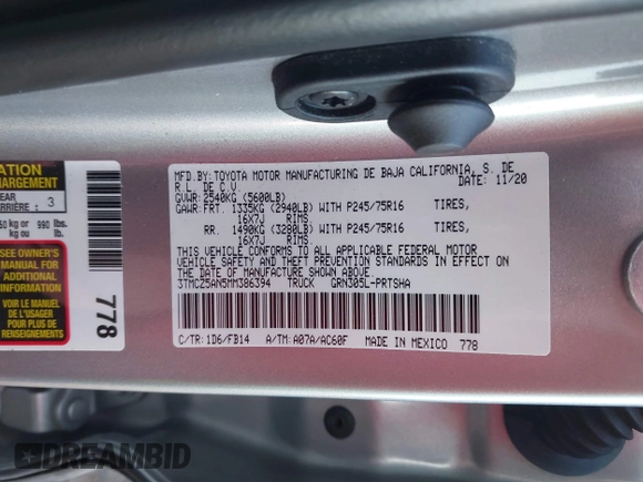 2021 Toyota Tacoma SR z VIN 3TMCZ5AN5MM386394, wystawiony jako IAAI lot #41821364 z przebiegiem 54 070 mil mil oraz . Historia ofert i sprzedaży dostępna na DreamBid. Obrazek 9.