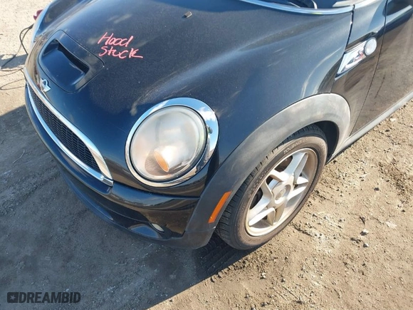 2009 MINI Cooper Clubman S with VIN WMWMM33559TP74672, listed as a IAAI auction lot 41352619 with 163,129 mi miles. Bid and sale history available at carsss.com. Image 6.