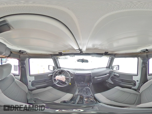 2007 Jeep Wrangler Unlimited X with VIN 1J4GA39117L169245, listed as a Copart auction lot 56731665 with 136,247 mi miles and Salvage title. Bid and sale history available at DreamBid. Image 15.