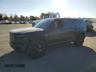 2022 Rivian R1S Launch Edition z VIN 7PDSGABL0NN001489, wystawiony jako Copart lot #78808374 z przebiegiem 25 768 mil mil oraz Szkoda całkowita • Salvage title. Historia ofert i sprzedaży dostępna na DreamBid. Obrazek 1.