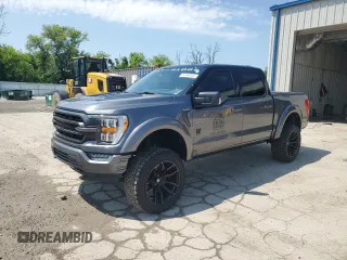 2021 Ford F-150 XL with VIN 1FTFW1E51MFD12771, listed as a Copart auction lot 61484555 with 36,154 mi miles and Salvage title. Bid and sale history available at DreamBid. Image 1.
