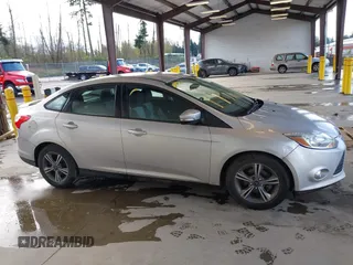 2014 Ford Focus SE with VIN 1FADP3F28EL433519, listed as a IAAI auction lot 41969007 with 137,064 mi miles. Bid and sale history available at carsss.com. Image 14.