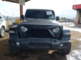2020 Jeep Wrangler Unlimited Sport S z VIN 1C4HJXDN8LW126929, wystawiony jako IAAI lot #41949281 z przebiegiem 111 085 mil mil oraz . Historia ofert i sprzedaży dostępna na DreamBid. Obrazek 12.