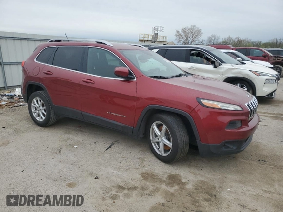 2015 Jeep Cherokee Latitude with VIN 1C4PJLCB3FW712356, listed as a Copart auction lot 51616355 with 153,972 mi miles and Salvage Title. Bid and sale history available at DreamBid. Image 4.