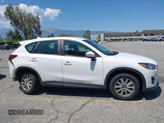 2016 Mazda CX-5 Sport с VIN JM3KE2BY5G0793032, выставлен на аукционе IAAI как лот 42128706 с пробегом 52 010 миль миль и . История ставок и продаж доступна на DreamBid. Изображение 13.