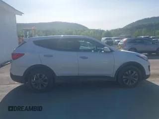 2016 Hyundai Santa Fe z VIN 5XYZTDLB7GG329320, wystawiony jako IAAI lot #42145591 z przebiegiem 106 345 mil mil oraz . Historia ofert i sprzedaży dostępna na DreamBid. Obrazek 13.