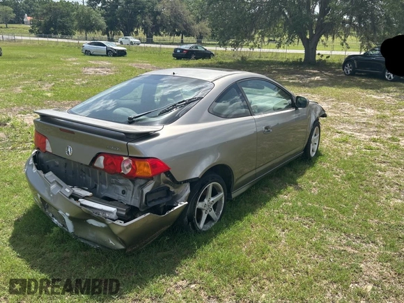 2003 Acura RSX z VIN JH4DC54873S002163, wystawiony jako Copart lot #51872605 z przebiegiem Nie podano mil oraz Szkoda całkowita • Salvage title. Historia ofert i sprzedaży dostępna na DreamBid. Obrazek 4.