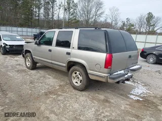1998 Chevrolet Tahoe with VIN 1GNEK13R4WJ346417, listed as a IAAI auction lot 41390436 with 184,094 mi miles. Bid and sale history available at carsss.com. Image 3.