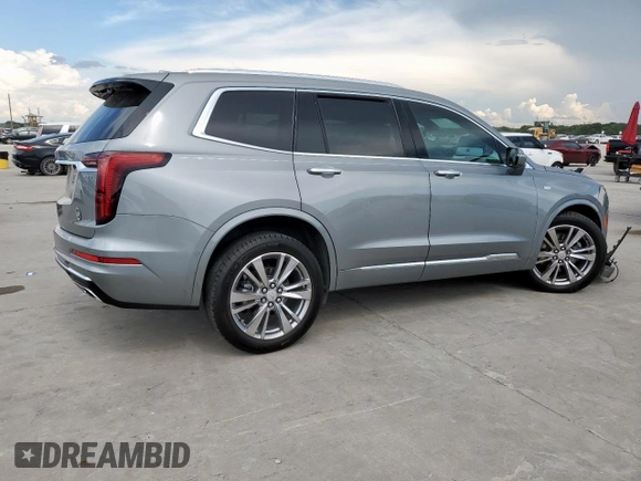 2024 Cadillac XT6 FWD Premium Luxury with VIN 1GYKPCRS7RZ704046, listed as a Copart auction lot 62534055 with 25,644 mi miles and Salvage title. Bid and sale history available at DreamBid. Image 3.