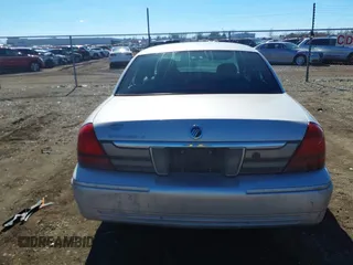 2006 Mercury Grand Marquis LS Premium z VIN 2MEHM75W56X605511, wystawiony jako IAAI lot #41642522 z przebiegiem 120 054 mil mil oraz . Historia ofert i sprzedaży dostępna na DreamBid. Obrazek 16.