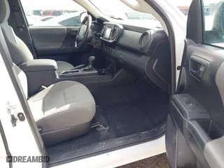2018 Toyota Tacoma SR with VIN 5TFRX5GN2JX114429, listed as a IAAI auction lot 41460407 with 84,243 mi miles. Bid and sale history available at carsss.com. Image 5.