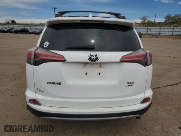 2018 Toyota RAV4 XLE with VIN 2T3RFREV2JW733050, listed as a Copart auction lot 53114585 with Not Provided miles and Salvage Title. Bid and sale history available at DreamBid. Image 6.