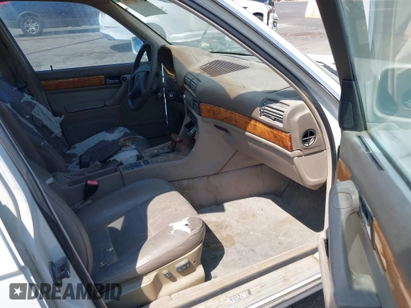 1994 BMW 7 Series z VIN WBAGD4324RDE65491, wystawiony jako IAAI lot #42761773 z przebiegiem 141 762 mil mil oraz . Historia ofert i sprzedaży dostępna na DreamBid. Obrazek 5.