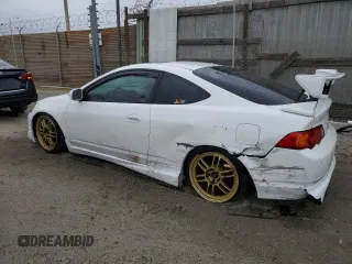 2002 Acura RSX Auto with VIN JH4DC548X2C034663, listed as a Copart auction lot 55980275 with 165,809 mi miles and Salvage title. Bid and sale history available at DreamBid. Image 2.