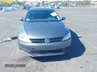 2013 Volkswagen Jetta SE z VIN 3VWDP7AJ0DM253879, wystawiony jako IAAI lot #42224779 z przebiegiem 215 268 mil mil oraz . Historia ofert i sprzedaży dostępna na DreamBid. Obrazek 6.
