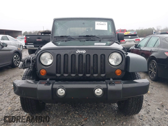 2012 Jeep Wrangler Sport z VIN 1C4AJWAG8CL262755, wystawiony jako IAAI lot #41566823 z przebiegiem 164 135 mil mil oraz . Historia ofert i sprzedaży dostępna na DreamBid. Obrazek 13.
