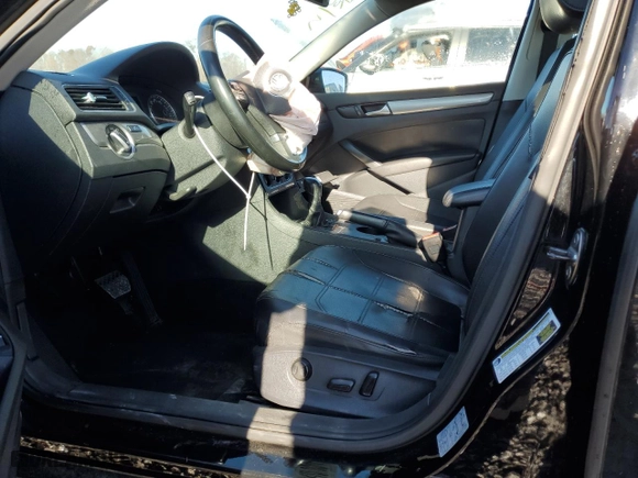 2014 Volkswagen Passat Wolfsburg Ed with VIN 1VWAT7A30EC098740, listed as a Copart auction lot 85651574 with 201,182 mi miles and Salvage Title. Bid and sale history available at carsss.com. Image 7.