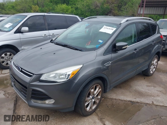 2014 Ford Escape Titanium with VIN 1FMCU0JX8EUD31028, listed as a IAAI auction lot 41943690 with 91,295 mi miles. Bid and sale history available at carsss.com. Image 2.