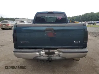 1999 Ford F-250 XL with VIN 1FTNX20FXXEA40858, listed as a Copart auction lot 63296925 with 368,565 mi miles and Salvage title. Bid and sale history available at DreamBid. Image 6.