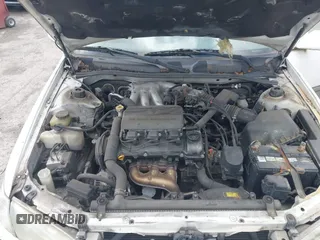 2001 Toyota Camry LE z VIN JT2BF22K310304712, wystawiony jako IAAI lot #42386743 z przebiegiem 103 552 mil mil oraz . Historia ofert i sprzedaży dostępna na DreamBid. Obrazek 10.