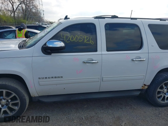 2013 Chevrolet Suburban LT with VIN 1GNSKJE79DR328718, listed as a IAAI auction lot 42005926 with 168,610 mi miles and . Bid and sale history available at DreamBid. Image 15.