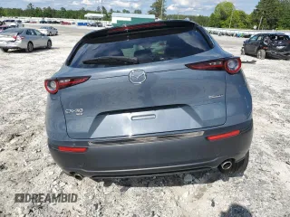 2023 Mazda CX-30 S Carbon Edition с VIN 3MVDMBCM9PM517237, выставлен на аукционе Copart как лот 55773945 с пробегом 17 724 миль миль и Списание • Salvage title. История ставок и продаж доступна на DreamBid. Изображение 6.