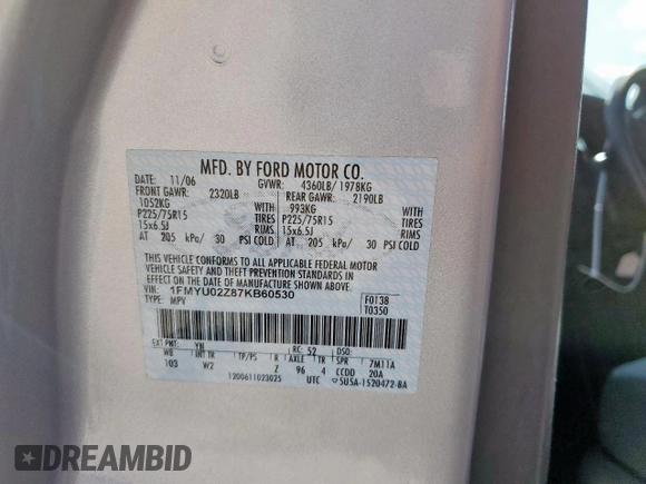 2007 Ford Escape XLS with VIN 1FMYU02Z87KB60530, listed as a Copart auction lot 61273345 with 57,574 mi miles and Salvage title. Bid and sale history available at DreamBid. Image 13.
