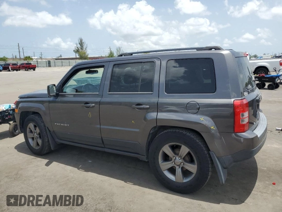 2014 Jeep Patriot High Altitude with VIN 1C4NJPFA2ED888925, listed as a Copart auction lot 60191435 with 122,308 mi miles and Salvage title. Bid and sale history available at DreamBid. Image 2.