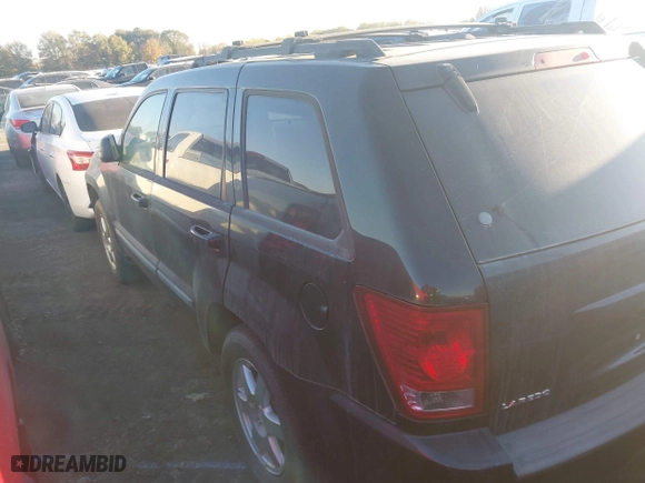 2009 Jeep Grand Cherokee Laredo with VIN 1J8GS48K49C536203, listed as a IAAI auction lot 41019376 with 1 mi miles. Bid and sale history available at carsss.com. Image 3.