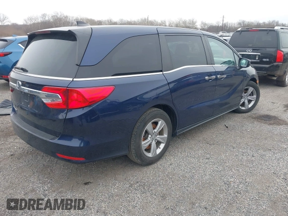 2020 Honda Odyssey EX-L with VIN 5FNRL6H70LB055122, listed as a IAAI auction lot 41620219 with 129,582 mi miles. Bid and sale history available at carsss.com. Image 4.