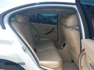 2013 BMW 3 Series 320i with VIN WBA3B1C50DK129576, listed as a IAAI auction lot 42393038 with 160,370 mi miles and . Bid and sale history available at DreamBid. Image 8.