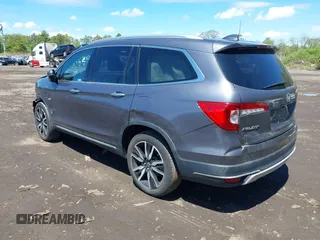 2021 Honda Pilot Touring 8-Passenger z VIN 5FNYF6H9XMB059037, wystawiony jako IAAI lot #42202410 z przebiegiem 49 267 mil mil oraz . Historia ofert i sprzedaży dostępna na DreamBid. Obrazek 3.