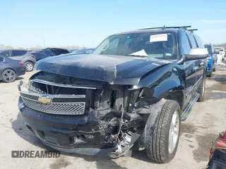 2011 Chevrolet Suburban LTZ with VIN 1GNSCKE03BR117338, listed as a IAAI auction lot 41878479 with 182,327 mi miles. Bid and sale history available at carsss.com. Image 2.