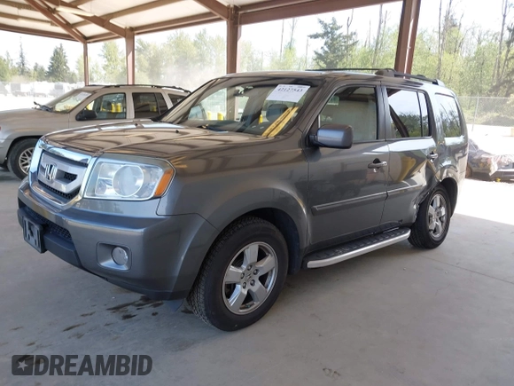 2011 Honda Pilot EX-L with VIN 5FNYF4H56BB503089, listed as a IAAI auction lot 42127543 with 144,227 mi miles. Bid and sale history available at carsss.com. Image 2.