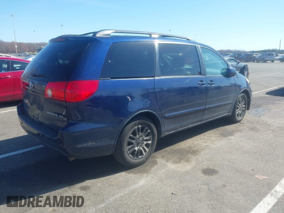 2007 Toyota Sienna XLE with VIN 5TDZK22C07S056161, listed as a IAAI auction lot 41820123 with 206,675 mi miles. Bid and sale history available at carsss.com. Image 4.
