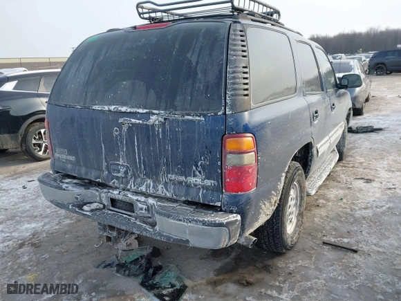 2003 Chevrolet Tahoe LT with VIN 1GNEC13Z63R182212, listed as a IAAI auction lot 41399286 with 241,980 mi miles. Bid and sale history available at carsss.com. Image 4.
