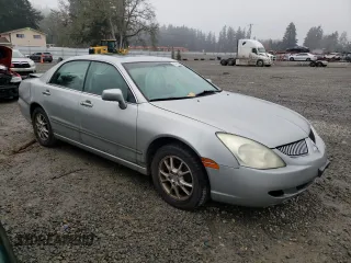 2004 Mitsubishi Diamante LS z VIN 6MMAP67P34T003796, wystawiony jako Copart lot #81683284 z przebiegiem 127 882 mil mil oraz Szkody całkowita. Historia ofert i sprzedaży dostępna na DreamBid. Obrazek 4.