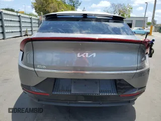2023 Kia EV6 Wind with VIN KNDC34LA4P5602445, listed as a Copart auction lot 54865515 with 6,885 mi miles and Clean Title. Bid and sale history available at carsss.com. Image 6.