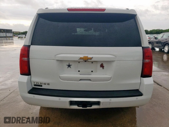 2016 Chevrolet Tahoe LT with VIN 1GNSCBKC2GR475679, listed as a Copart auction lot 54987195 with 130,387 mi miles and Salvage title. Bid and sale history available at DreamBid. Image 6.
