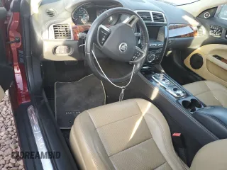 2013 Jaguar XK with VIN SAJWA4GB0DLB50530, listed as a Copart auction lot 82715724 with 24,634 mi miles and Salvage Title. Bid and sale history available at carsss.com. Image 8.
