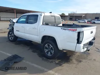 2017 Toyota Tacoma SR5 with VIN 5TFCZ5AN0HX077402, listed as a IAAI auction lot 41603762 with 118,257 mi miles and . Bid and sale history available at DreamBid. Image 3.