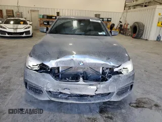 2018 BMW 5 Series 530i xDrive z VIN WBAJA7C56JWA71087, wystawiony jako Copart lot #42373605 z przebiegiem 113 635 mil mil oraz Nie do naprawy • Non repairable. Historia ofert i sprzedaży dostępna na DreamBid. Obrazek 5.