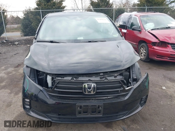 2023 Honda Odyssey Touring with VIN 5FNRL6H81PB068721, listed as a IAAI auction lot 41489618 with 20,202 mi miles and . Bid and sale history available at DreamBid. Image 13.