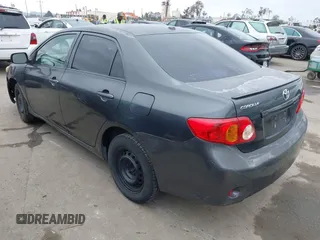 2009 Toyota Corolla with VIN 1NXBU40E49Z165082, listed as a IAAI auction lot 41881134 with 261,282 mi miles. Bid and sale history available at carsss.com. Image 3.