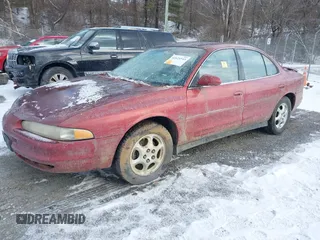 1999 Oldsmobile Intrigue GL z VIN 1G3WS52KXXF335273, wystawiony jako IAAI lot #41624543 z przebiegiem 106 606 mil mil oraz . Historia ofert i sprzedaży dostępna na DreamBid. Obrazek 2.