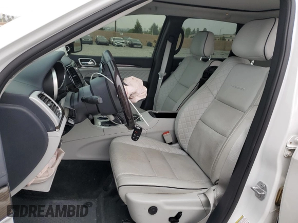 2019 Jeep Grand Cherokee Summit with VIN 1C4RJFJT8KC558499, listed as a Copart auction lot 54074725 with 65,844 mi miles and Salvage title. Bid and sale history available at DreamBid. Image 7.