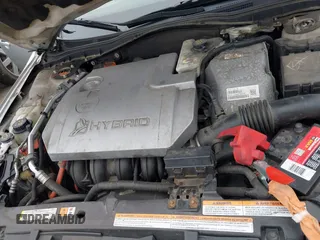 2010 Ford Fusion Hybrid with VIN 3FADP0L33AR185509, listed as a IAAI auction lot 41798825 with 155,934 mi miles. Bid and sale history available at carsss.com. Image 10.