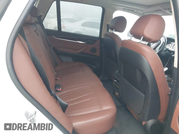 2016 BMW X5 xDrive40e with VIN 5UXKT0C59G0S79593, listed as a IAAI auction lot 41846666 with 57,178 mi miles and . Bid and sale history available at DreamBid. Image 8.