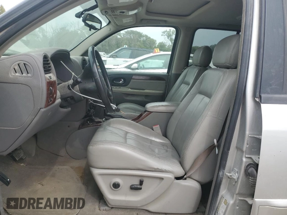 2005 GMC Envoy SLT with VIN 1GKDT13S852330514, listed as a Copart auction lot 71190504 with 203,616 mi miles and Salvage Title. Bid and sale history available at carsss.com. Image 7.